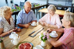 Old Group of people enjoying tea